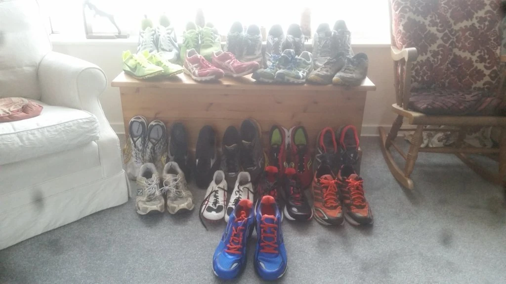 Lots of pairs of running shoes
