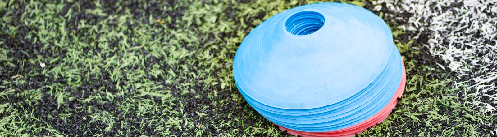 A stack of flexi cones on grass