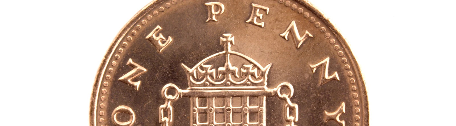 A close up of a British penny